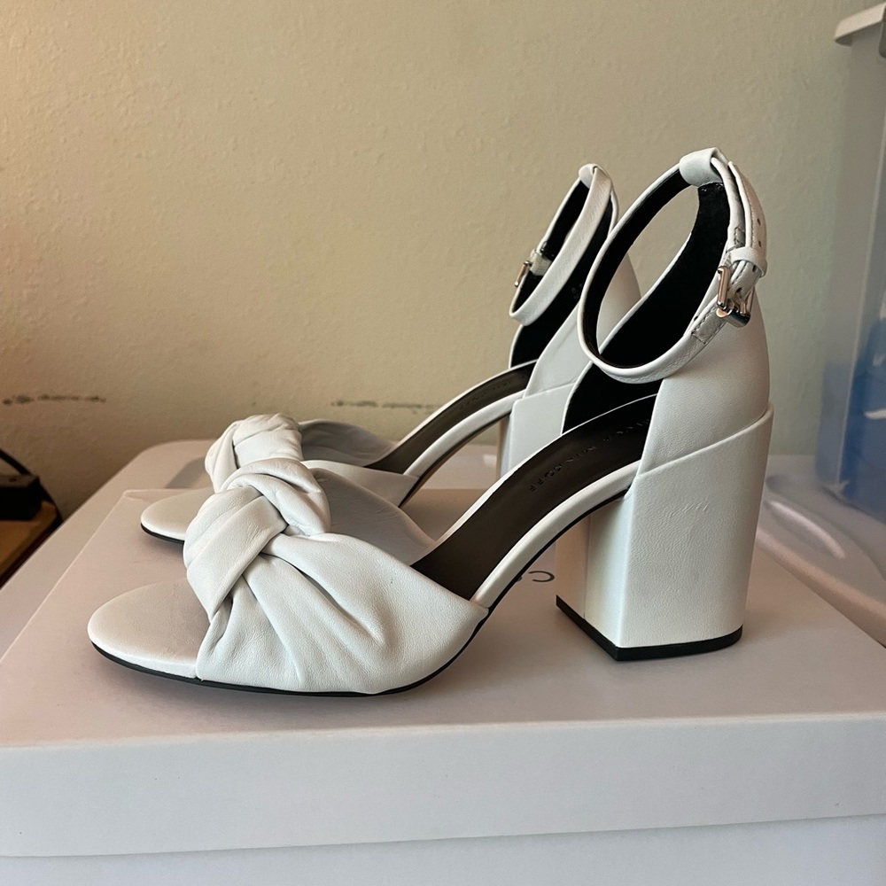 White leather sandals with ankle strap.  Rebecca Minkoff size 8.5 medium.